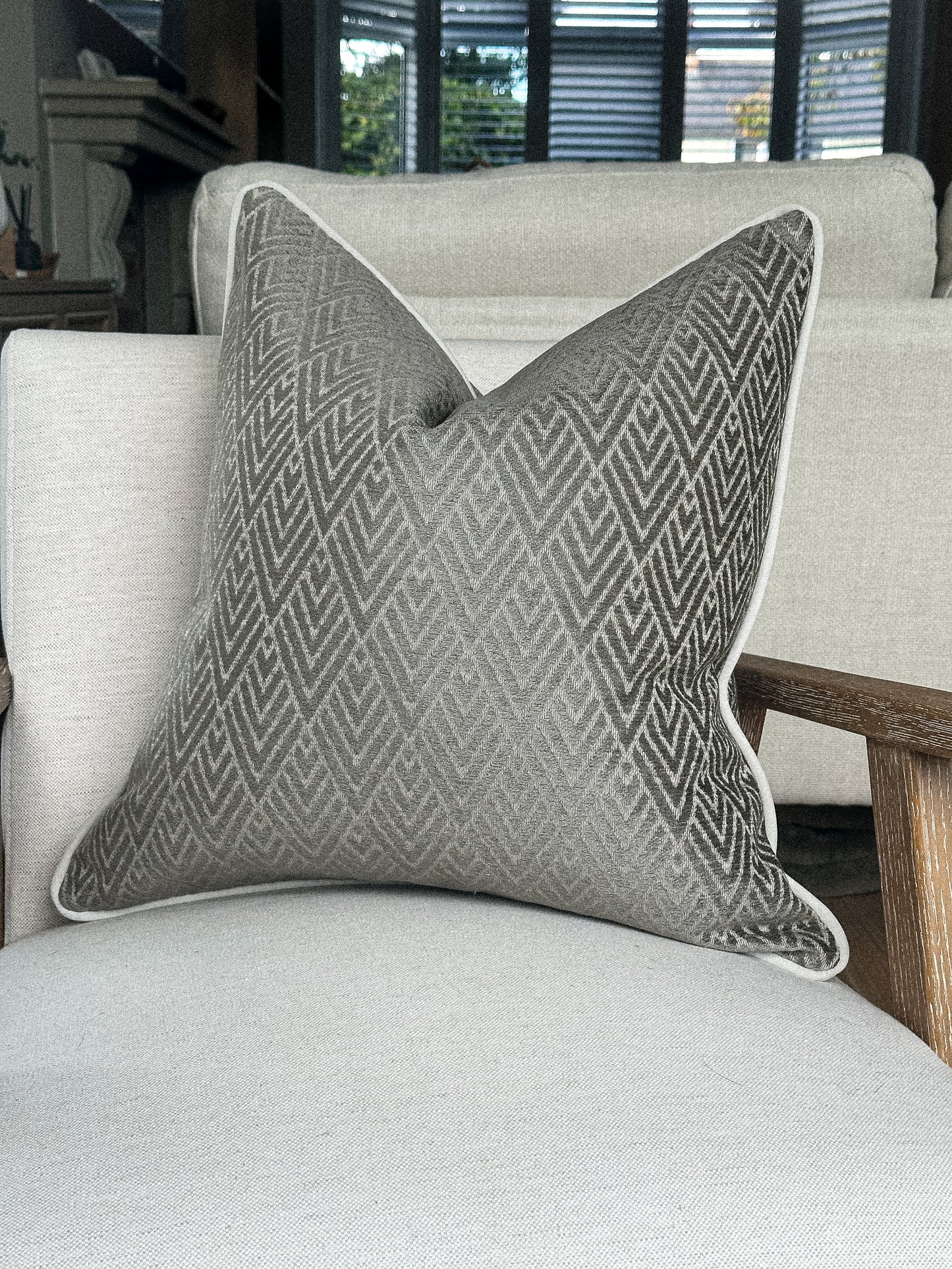 Luxury taupe grey geometric cushion cover.