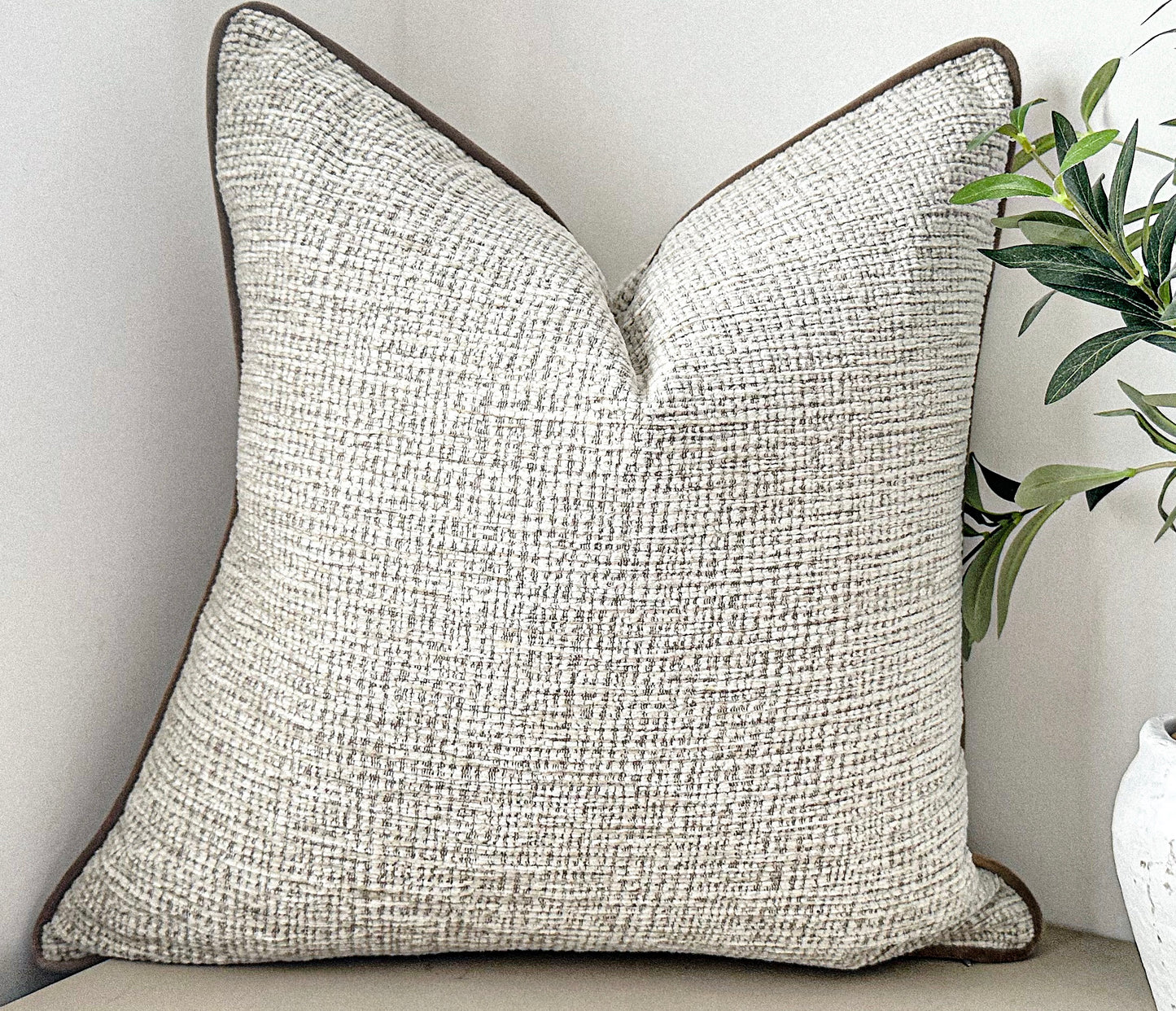 Soft cream ivory textured pillow.