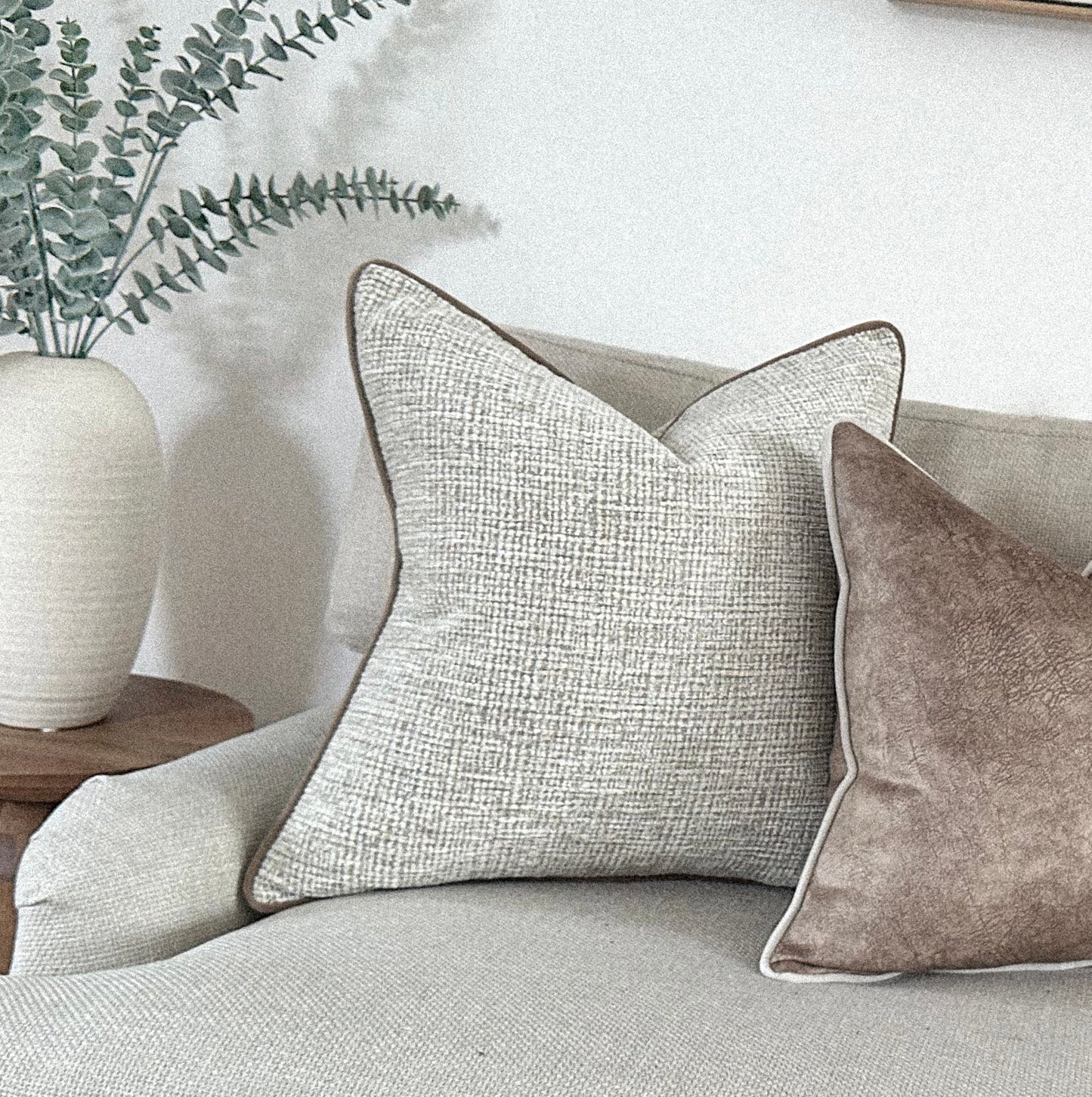 Cosy neutral textured cushion cover.