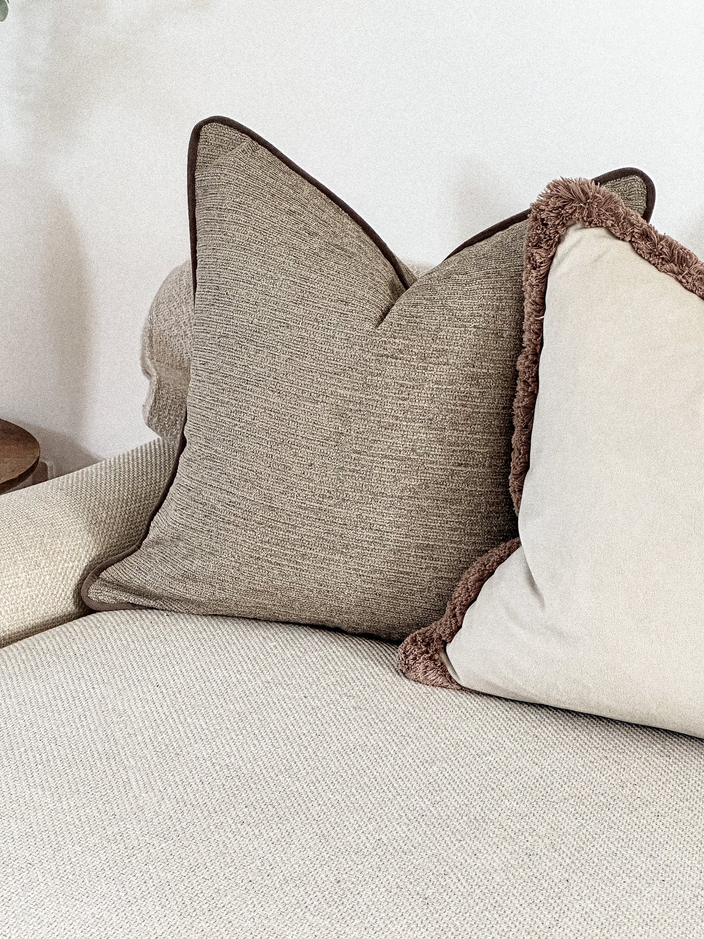 Modern organic beige throw pillow.