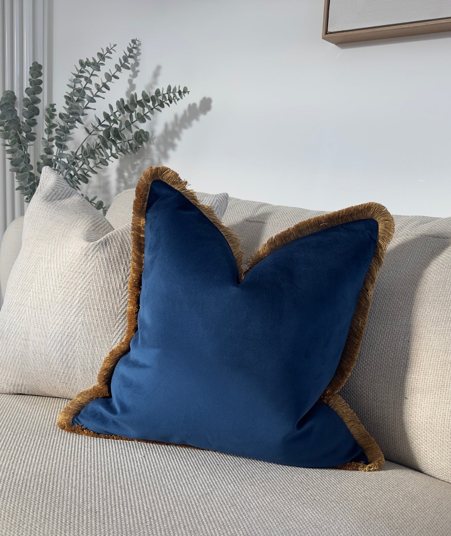 Blue velvet cushion cover with fringe