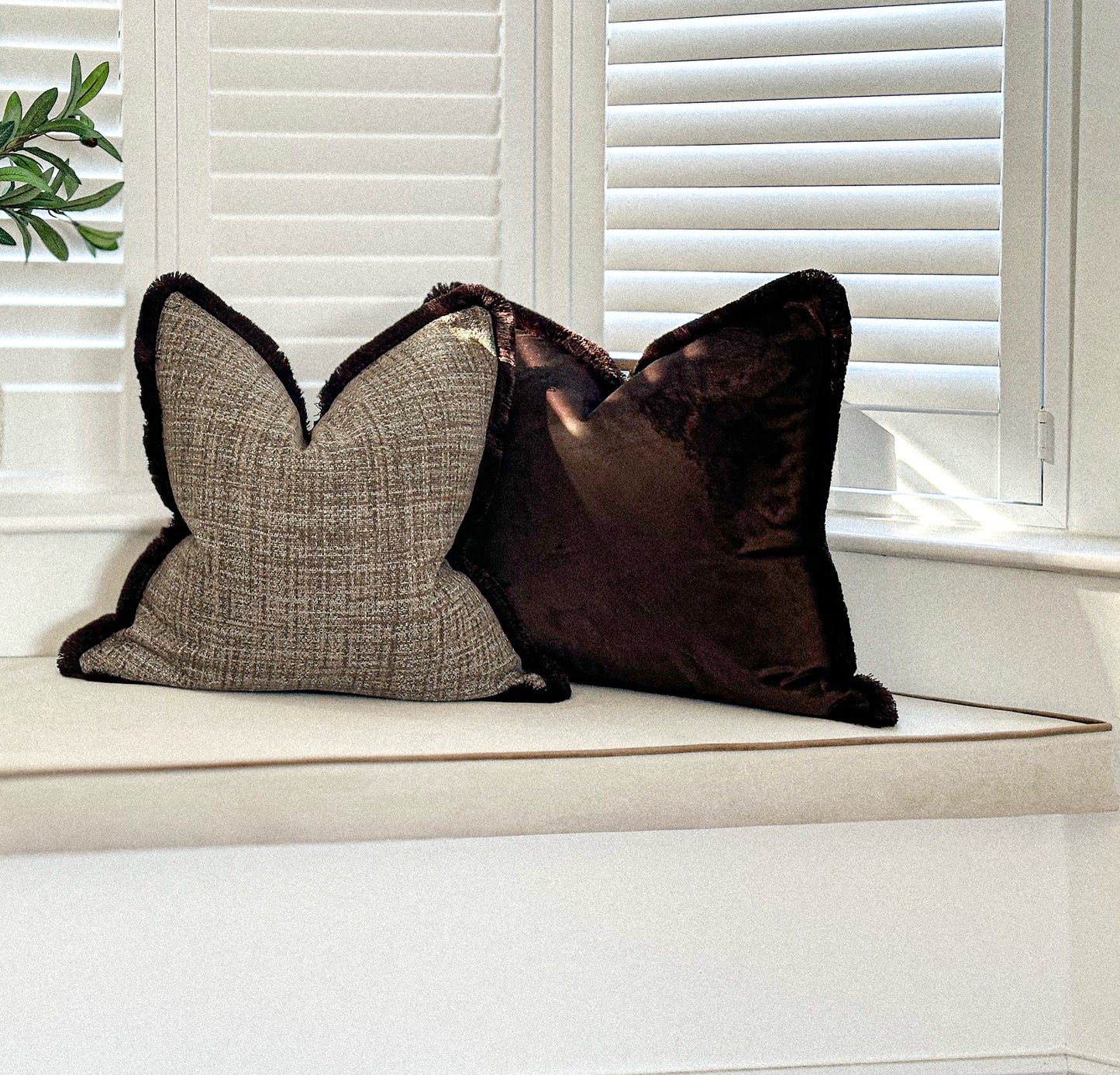 Luxury dark brown chocolate velvet cushion cover with fringe trim.