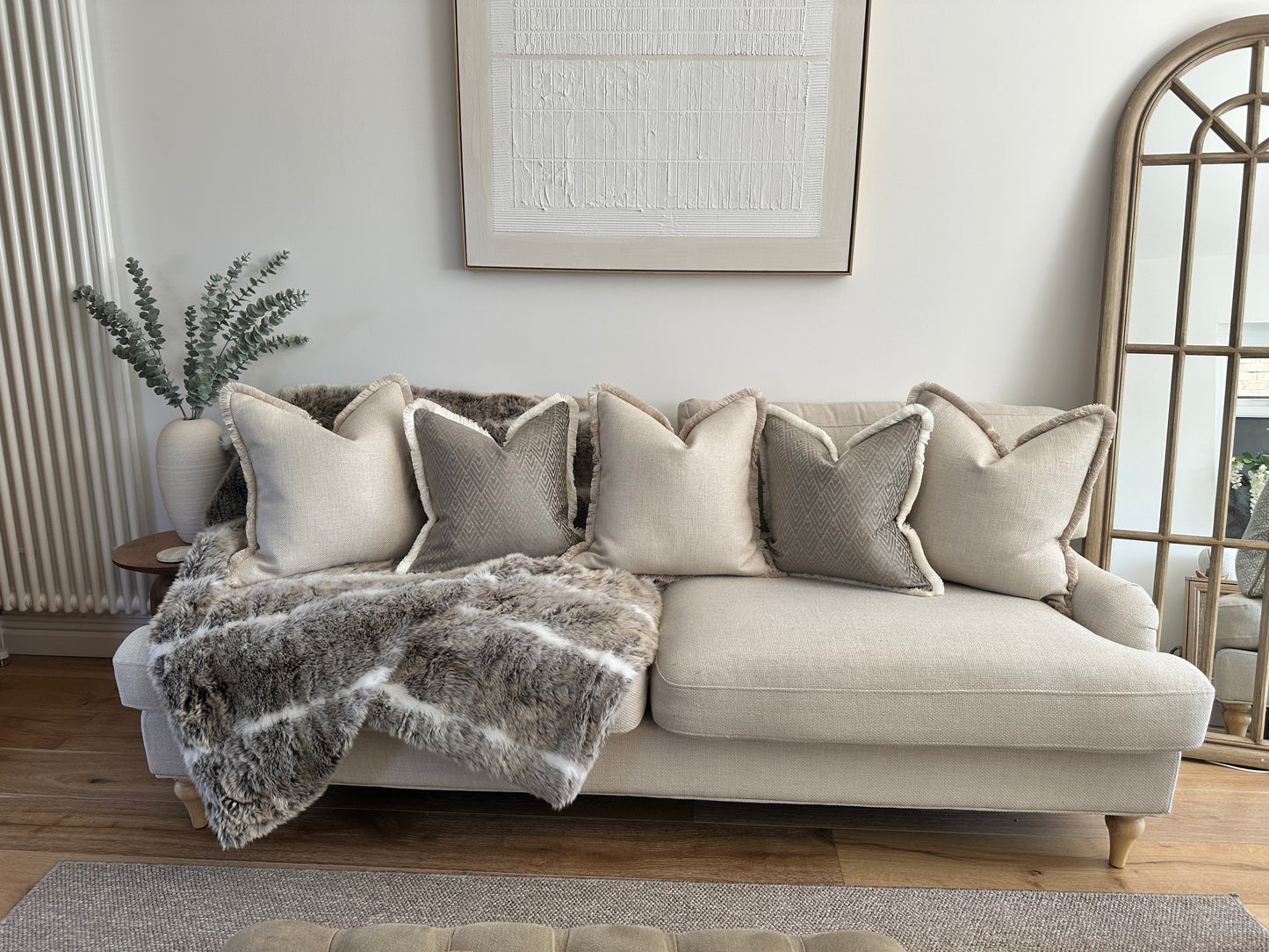 Luxury cushion combo in ivory cream and grey taupe. A set of luxury modern pillows. Neutral home inspo