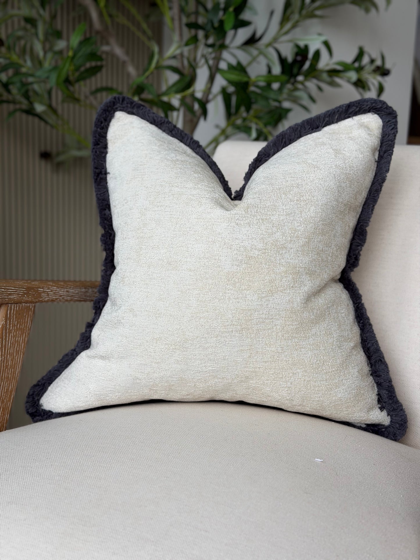 Textured ivory cushion cover - storm fringe