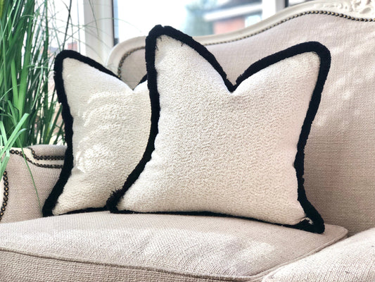 white cushion black edges