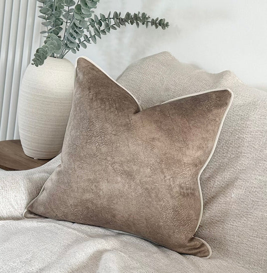Beige luxury velvet like cushion cover with ivory white piping.