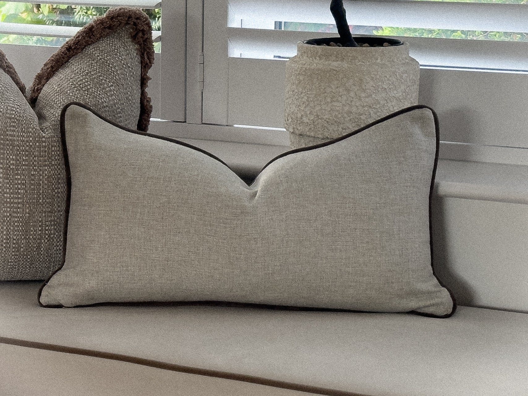 Neutral modern farmhouse style lumbar pillow.