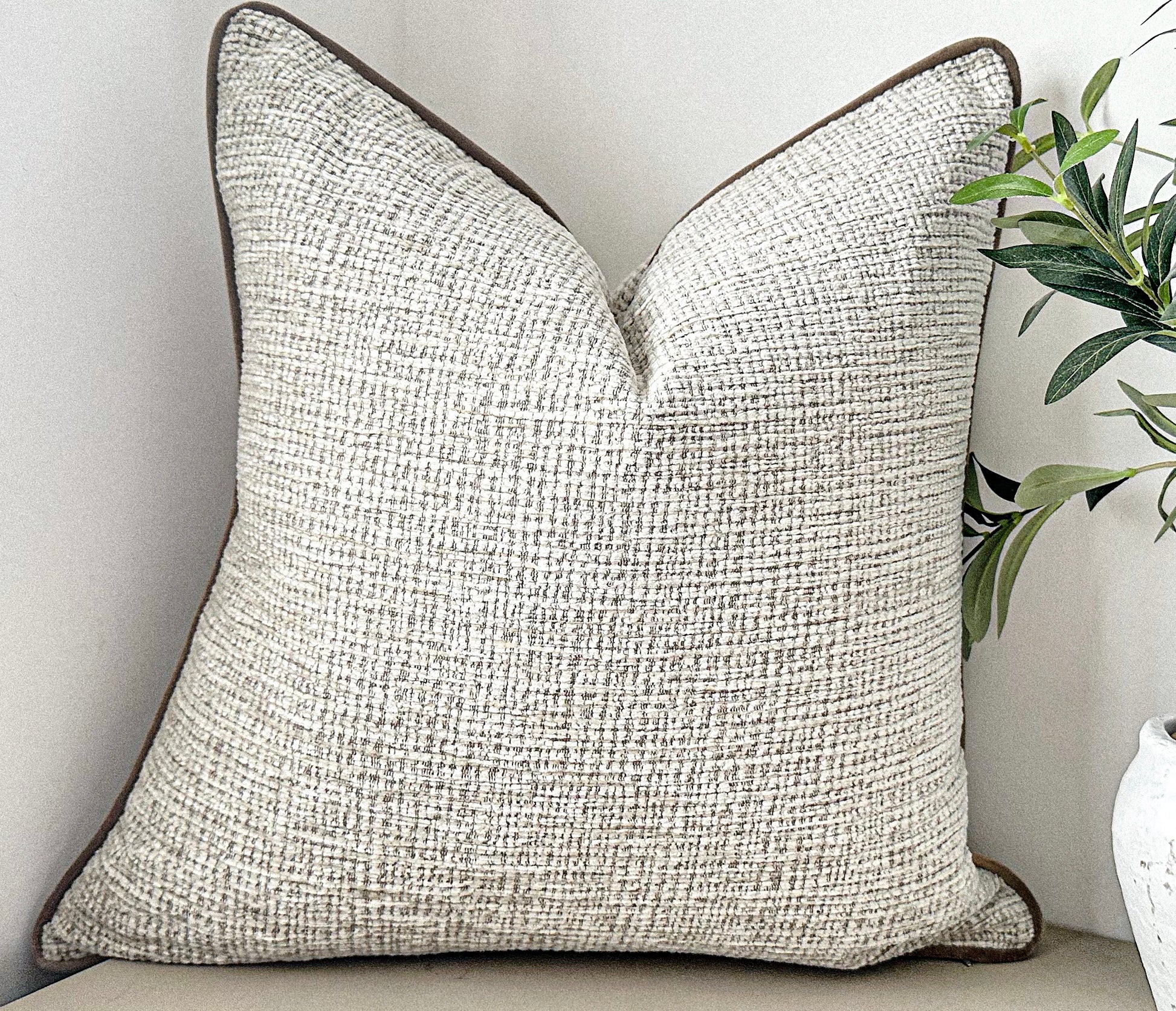 Soft cream ivory textured pillow.