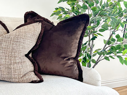 Luxury Dark brown velvet cushion with fringe trim made by the cosy cushion shop.