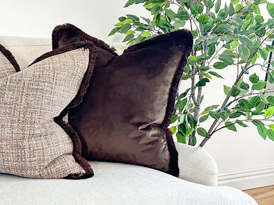 Luxury Dark brown velvet cushion with fringe trim made by the cosy cushion shop.
