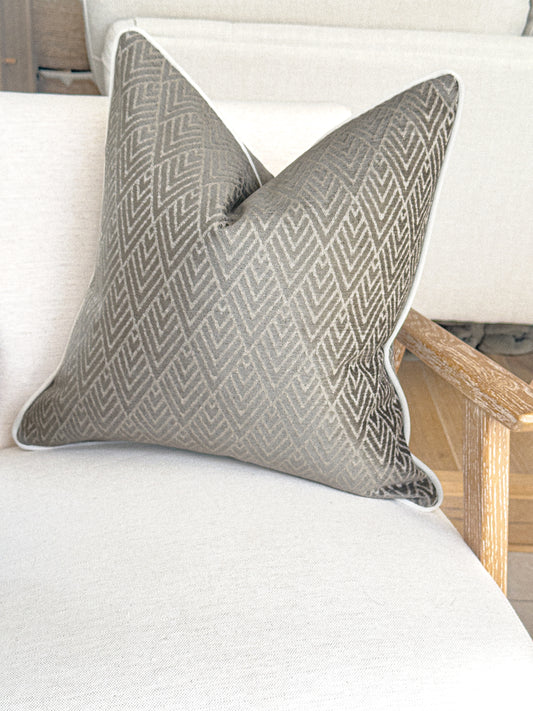 Taupe grey throw pillow with geometric design, custom made in the UK.