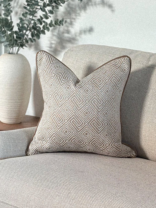 Luxury beige geometric patterned cushion