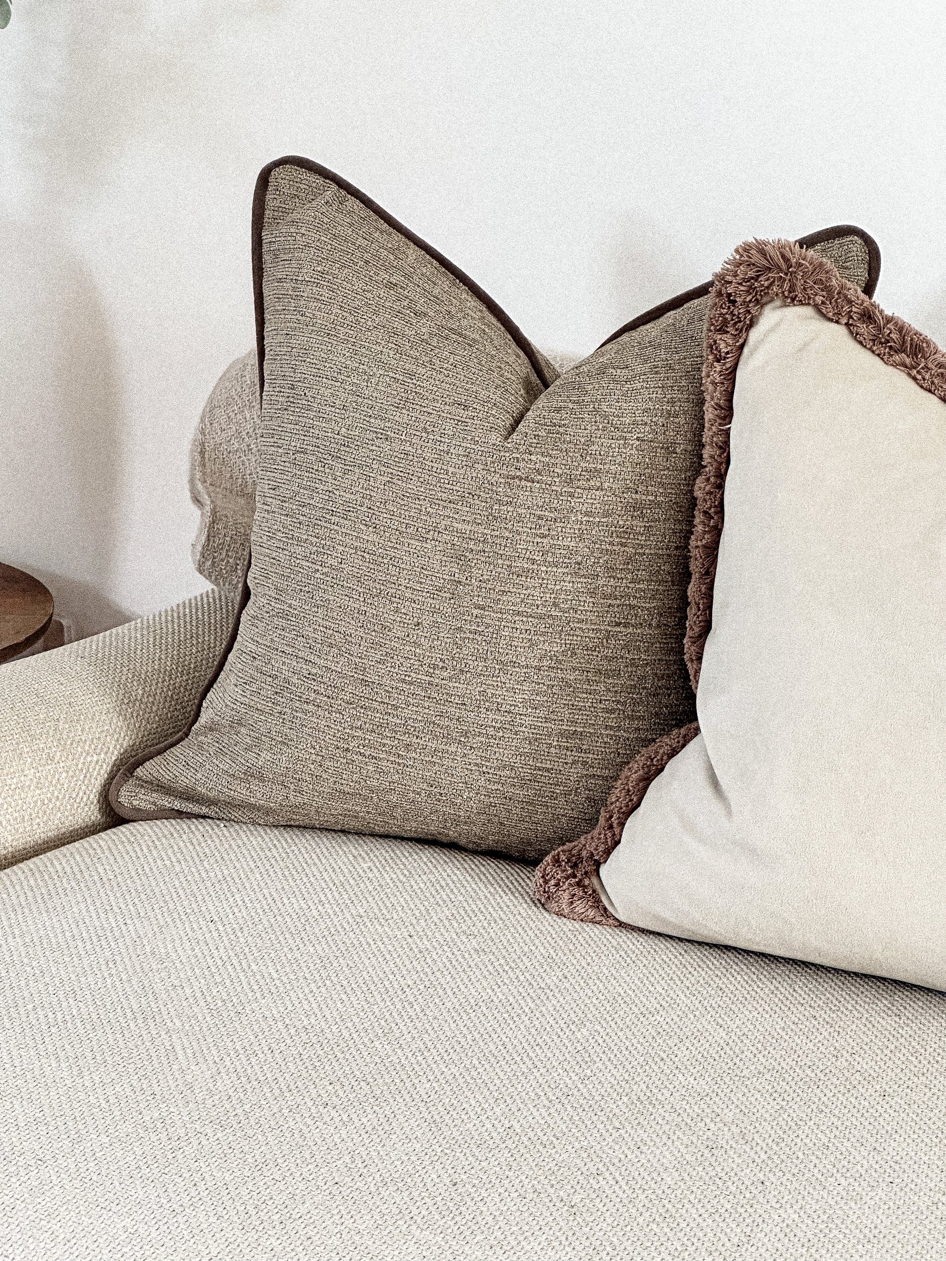 Modern organic beige throw pillow.