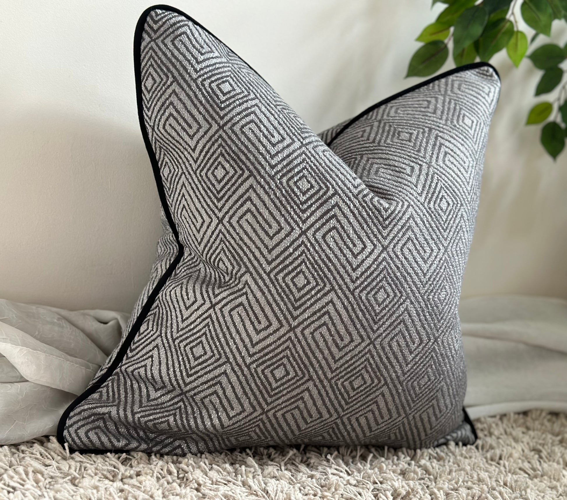 Grey textured cushion deals