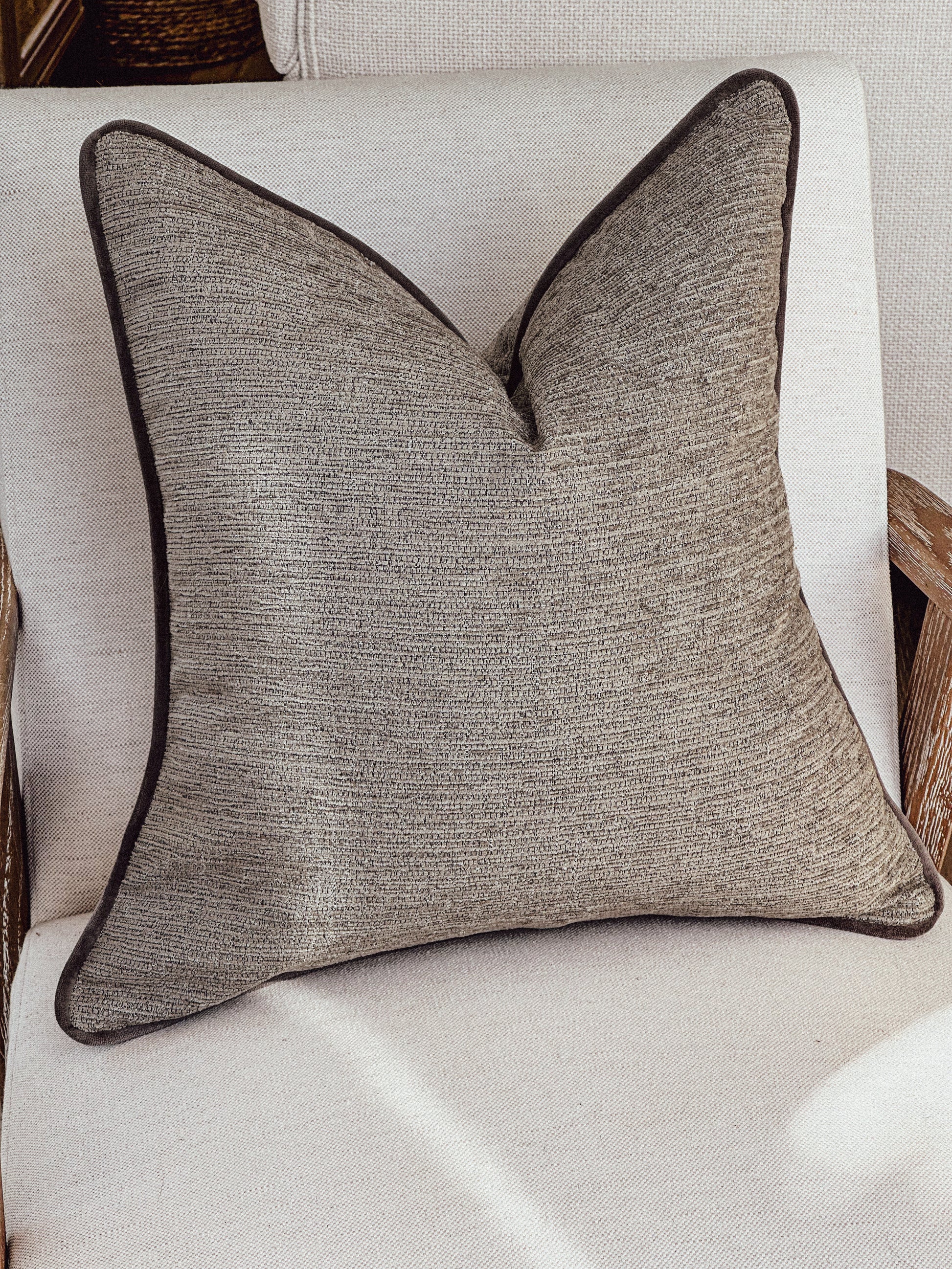 Neutral home decor scatter cushions.