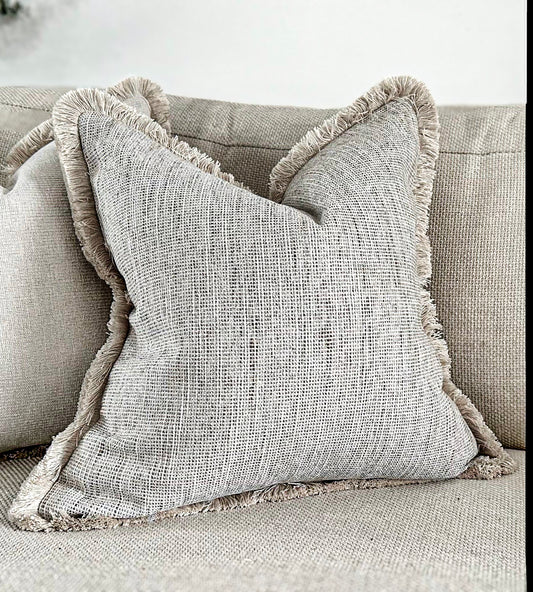 Luxury textured neutral cushion cover with fringe. Custom made bespoke cushions by the cosy cushion shop.