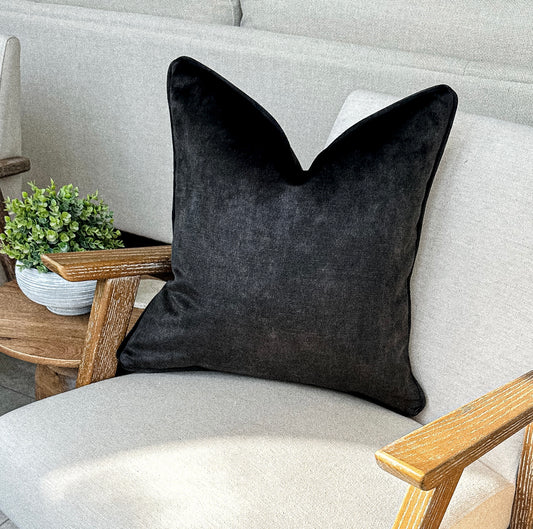 Luxury charcoal black toned velvet cushion.