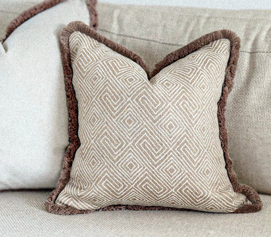 Luxury patterned cushion cover with fringe for neutral country farmhouse home decor styles. Custom made, bespoke cushions by the cosy cushion shop.
