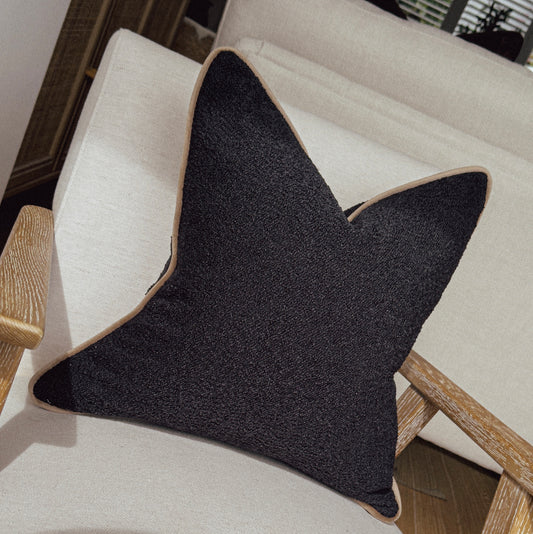 Black boucle cushion with beige piping