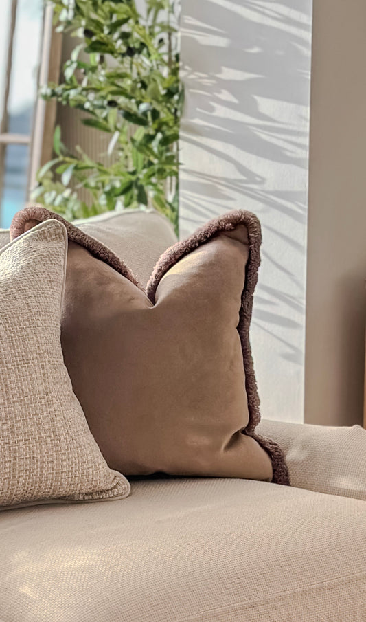 Luxury beige velvet cushion with fringe trim