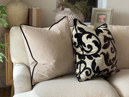 Cream and black luxury style cushions with piping trim