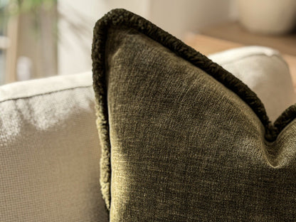 Deep green cushion fringe.