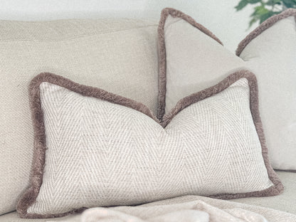 Luxury herringbone cushion cover with fri be trim. Custom made bespoke pillows by the cosy cushion shop.