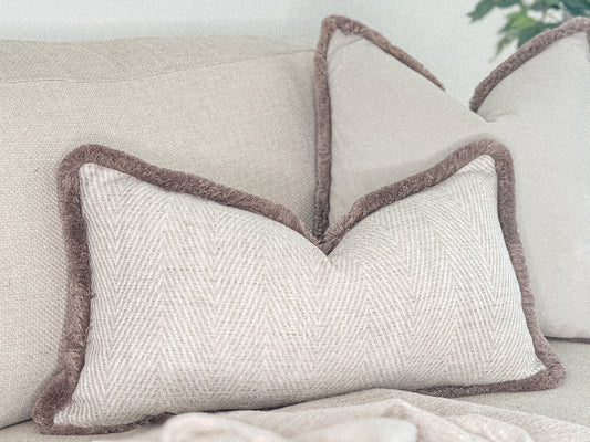 Luxury herringbone cushion cover with fri be trim. Custom made bespoke pillows by the cosy cushion shop.