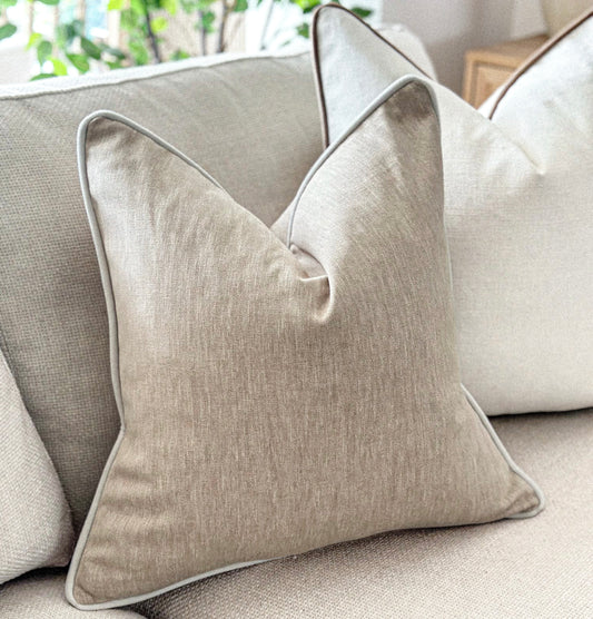 Classic stone beige scatter cushion with subtle contrast trim — perfect for earthy, understated interiors.