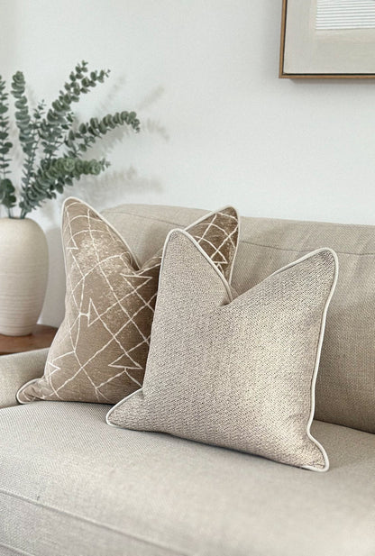 Warm beige woven pillow cover with subtle texture — ideal for classic, timeless interiors.