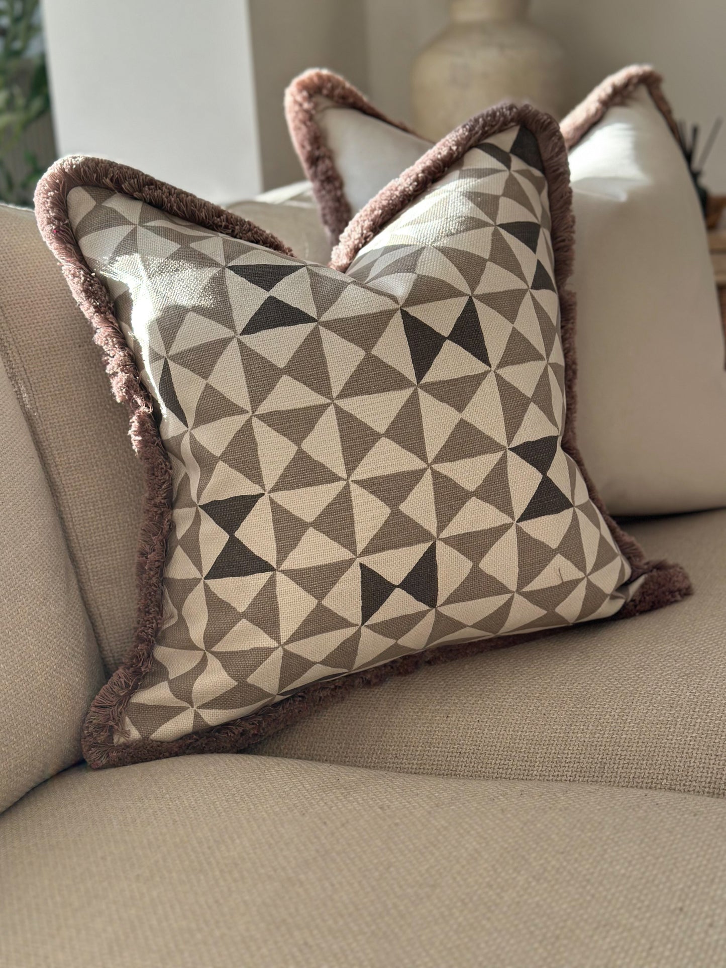 Architectural taupe and natural fabric scatter cushion — designed for timeless, design-led homes.